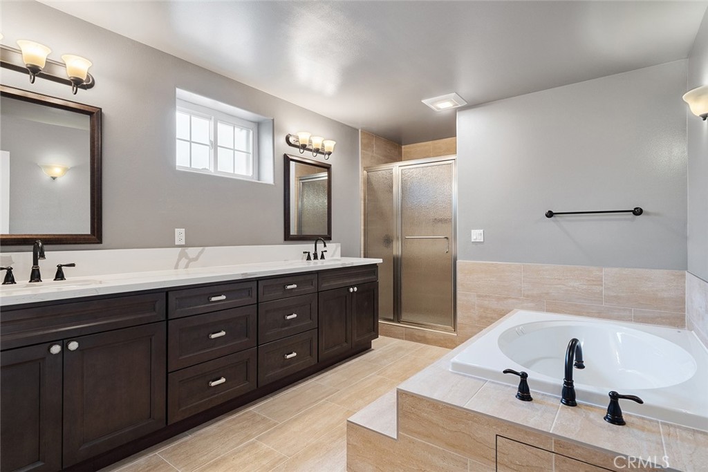 849 Balboa Drive Arcadia, CA 91007 - Photo 40 of 54 a spacious bathroom with a double vanity sink mirror and bathtub
