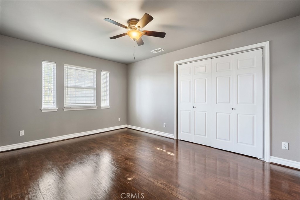 849 Balboa Drive Arcadia, CA 91007 - Photo 45 of 54 an empty room with wooden floor and windows