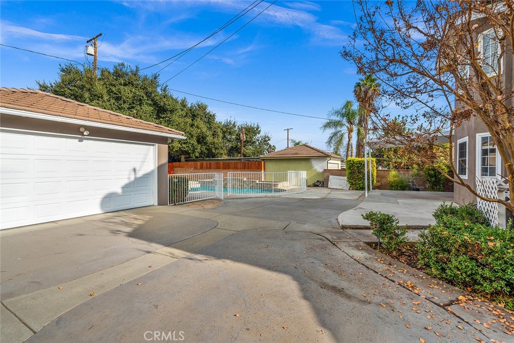 849 Balboa Drive Arcadia, CA 91007 - Photo 48 of 54 a front view of a house with a yard and garage