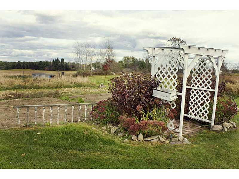 852 River Road Buxton, ME 04093 - Photo 6 of 35 Exterior Front. Vegetable gardens