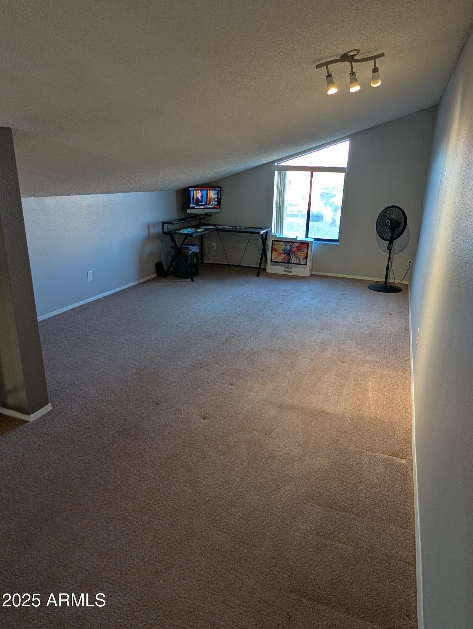 1440 North Idaho Road, Unit 2050 Apache Junction, AZ 85119 - Photo 15 of 21 a view of room with a window