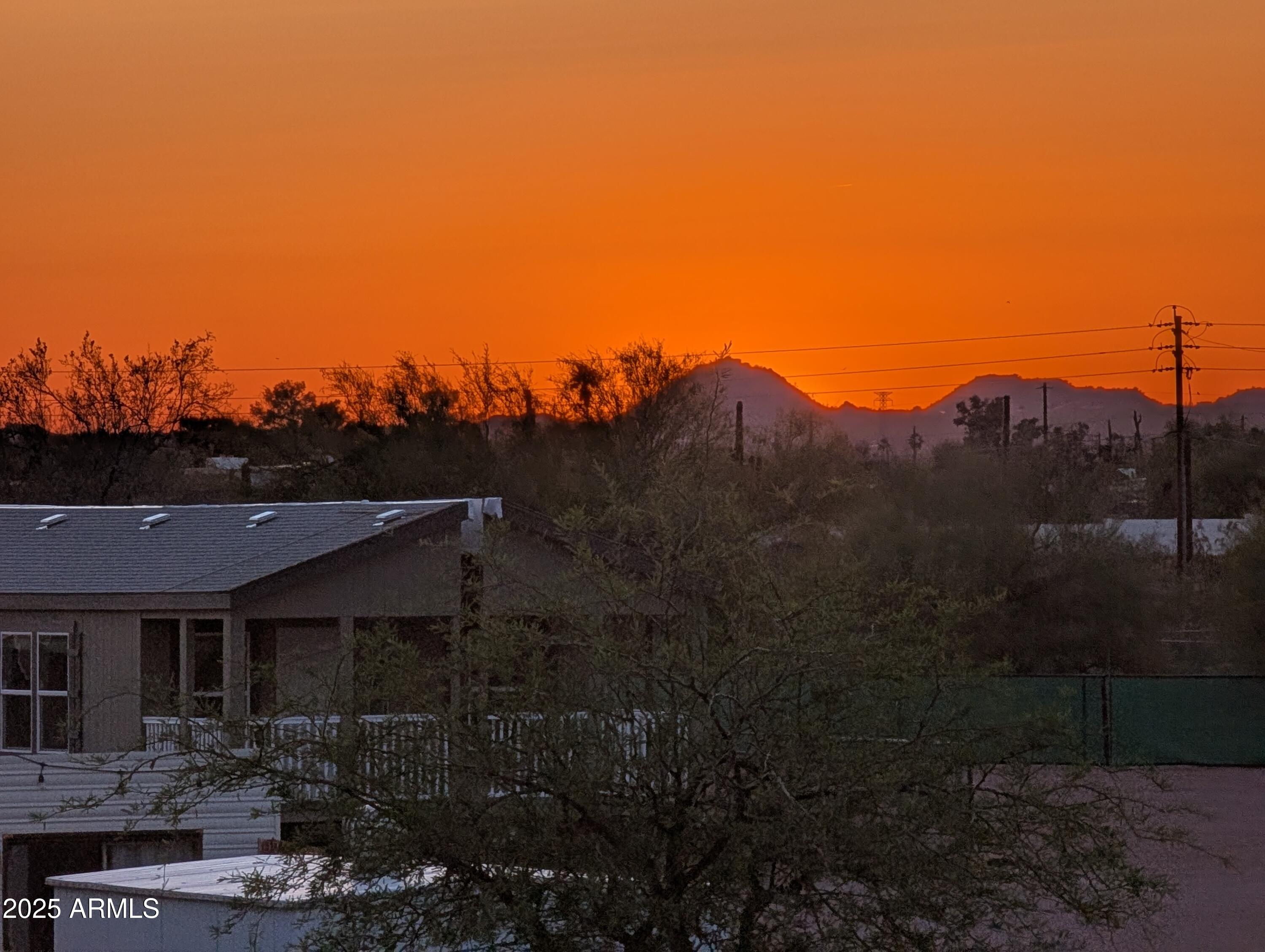 1440 North Idaho Road, Unit 2050 Apache Junction, AZ 85119 - Photo 2 of 21 a view of house and outdoor space