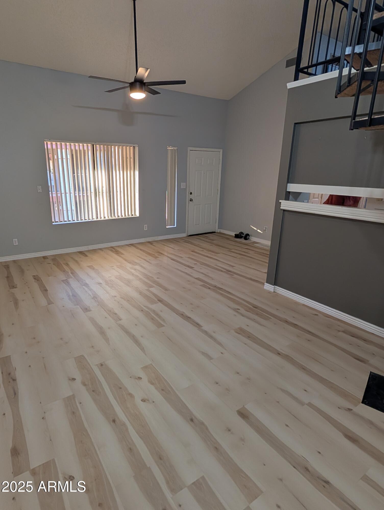 1440 North Idaho Road, Unit 2050 Apache Junction, AZ 85119 - Photo 5 of 21 a view of an empty room with a window