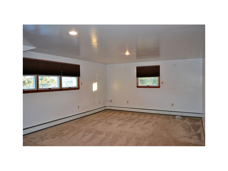 225 Ridge Road Sewickley, PA 15143 - Photo 18 of 25 Master Bedroom. The master bedroom is huge! Room darkening shades have been added and there are two double closets and an en suite master bathroom with double sinks and a linen closet.