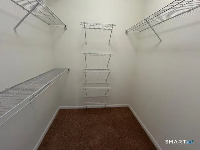 a view of a room with racks on the wall