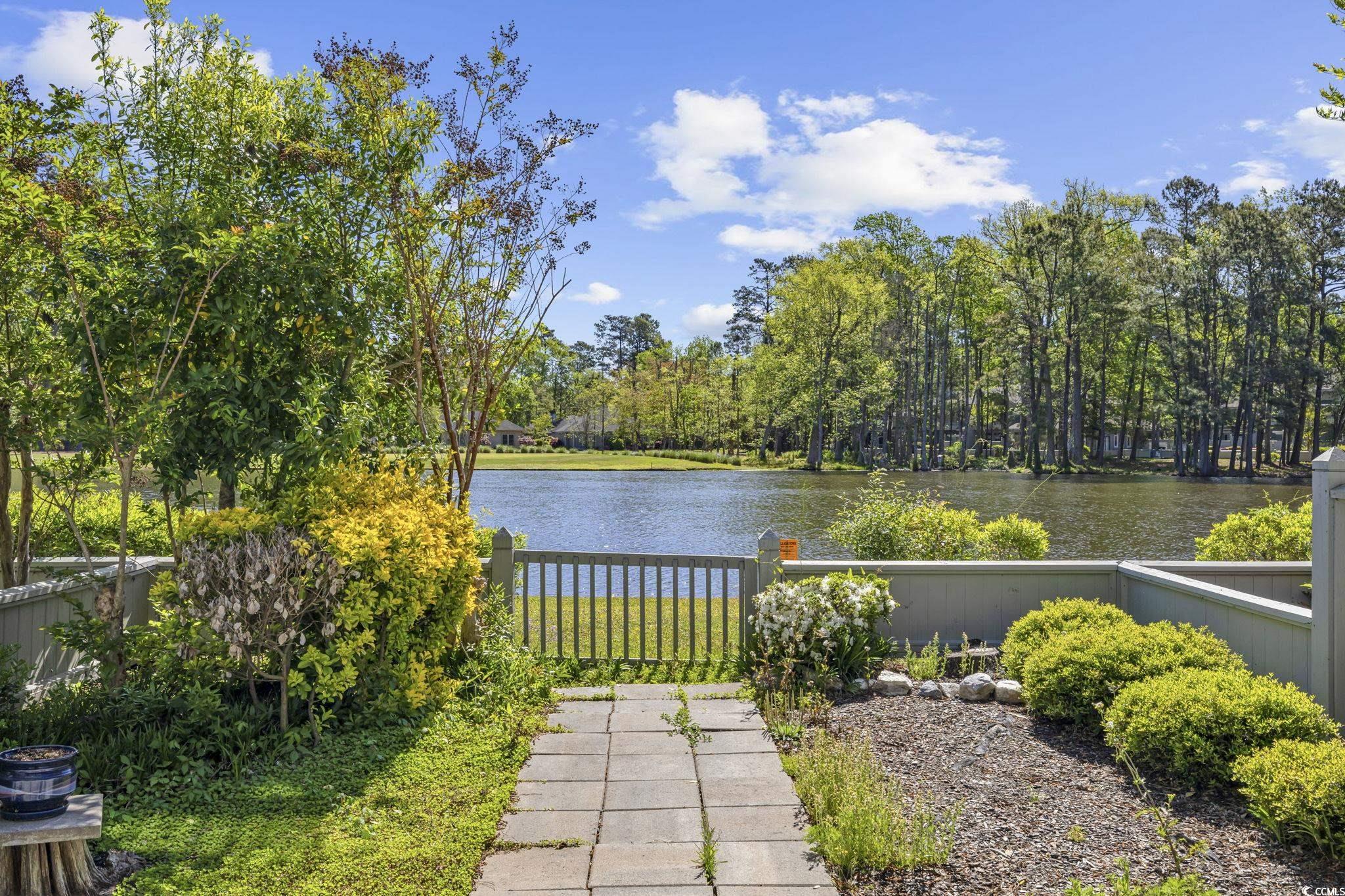 1221 Tidewater Drive, Unit 412 North Myrtle Beach, SC 29582 - Photo 26 of 36 Water view featuring a tree filled landscape
