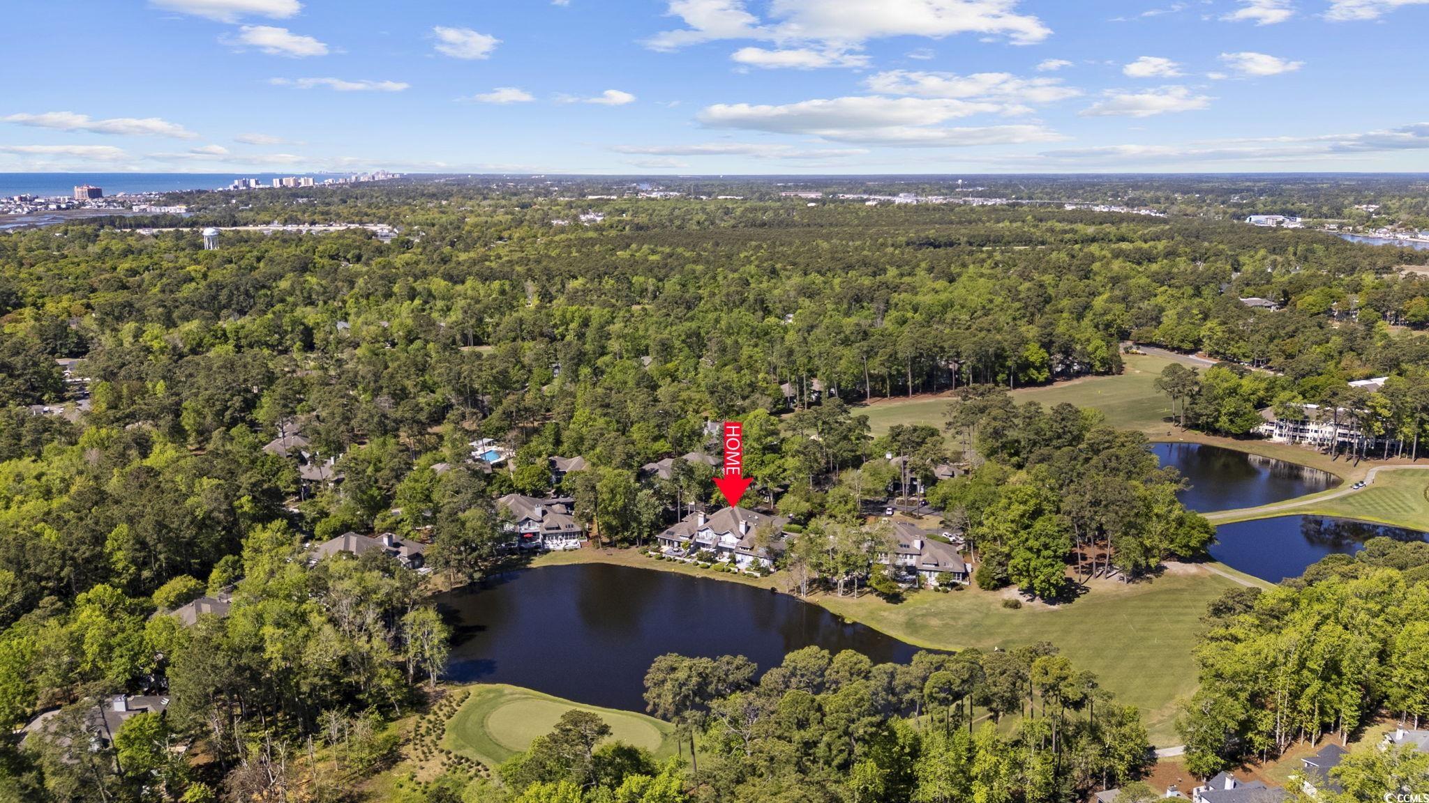 1221 Tidewater Drive, Unit 412 North Myrtle Beach, SC 29582 - Photo 28 of 36 View of property location with a large body of water and a golf course