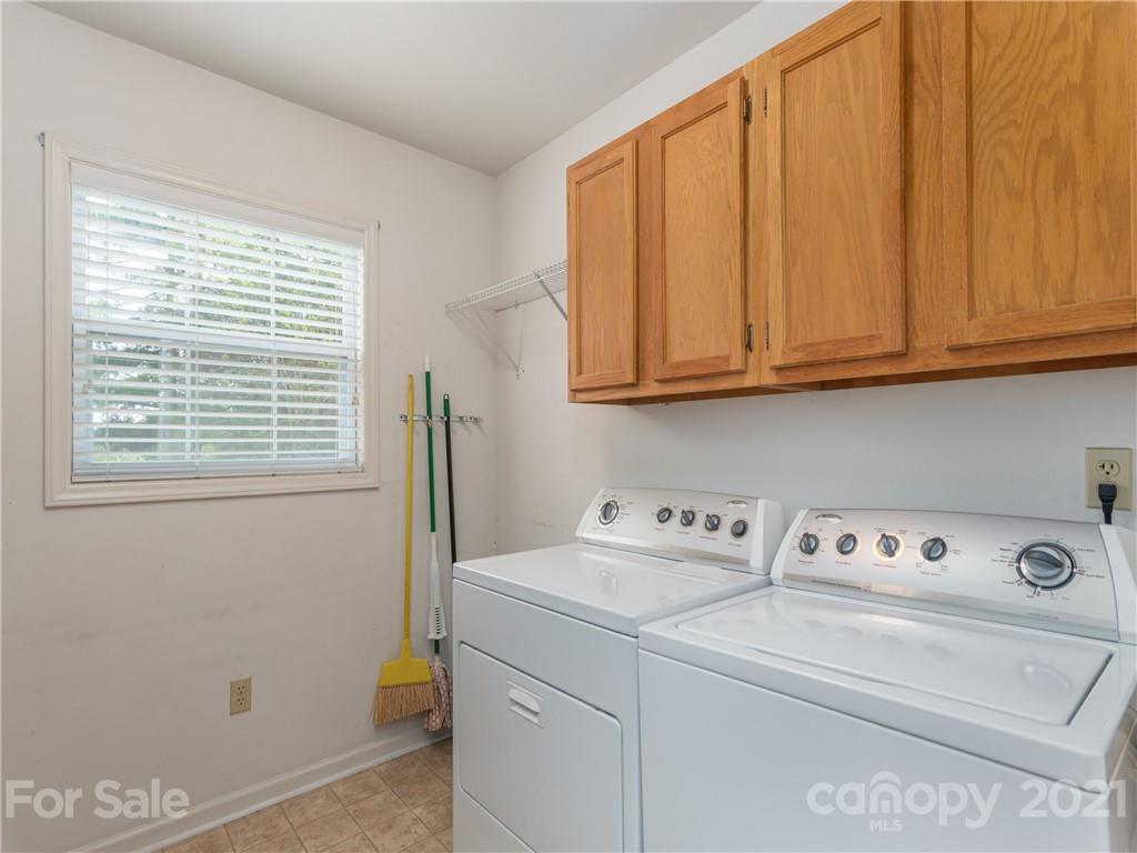 100 Ridgeline Road Clyde, NC 28721 - Photo 11 of 26 a utility room with dryer and washer