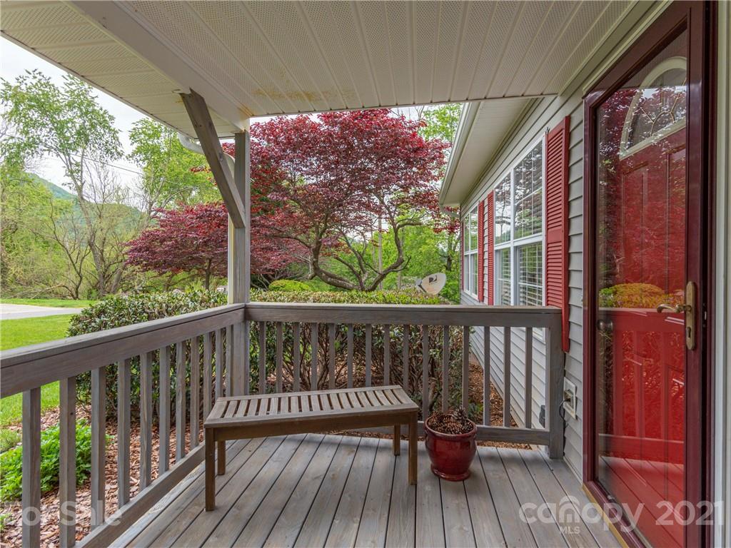 100 Ridgeline Road Clyde, NC 28721 - Photo 4 of 26 a view of balcony with wooden floor