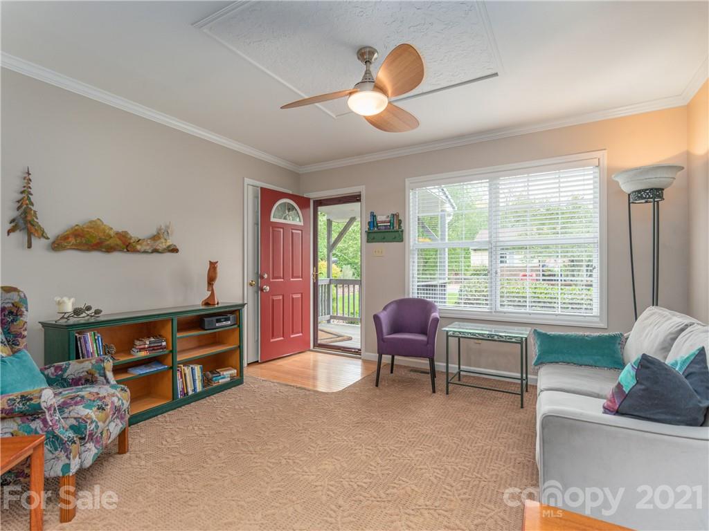 100 Ridgeline Road Clyde, NC 28721 - Photo 5 of 26 a living room with furniture and a window