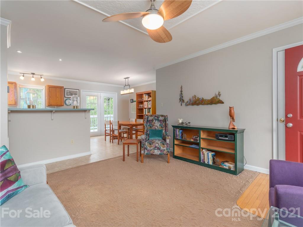 100 Ridgeline Road Clyde, NC 28721 - Photo 6 of 26 a living room with furniture and a dining table