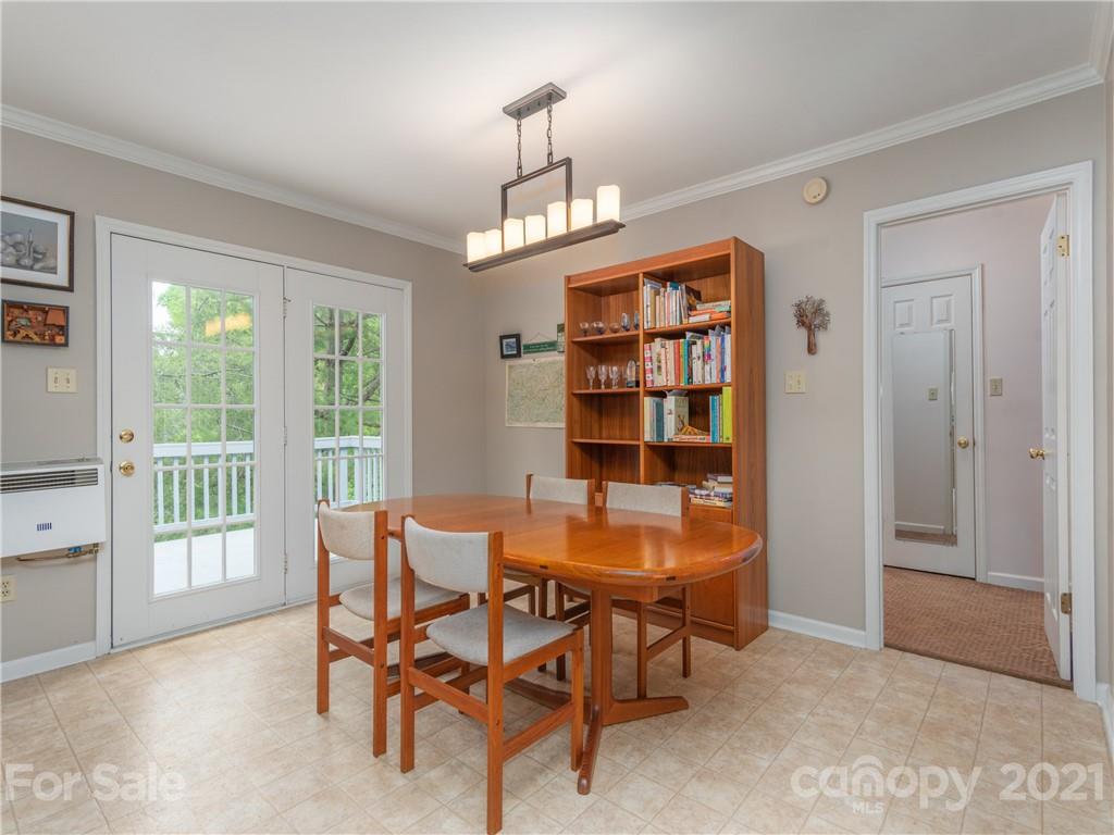100 Ridgeline Road Clyde, NC 28721 - Photo 7 of 26 a dining room with furniture and window