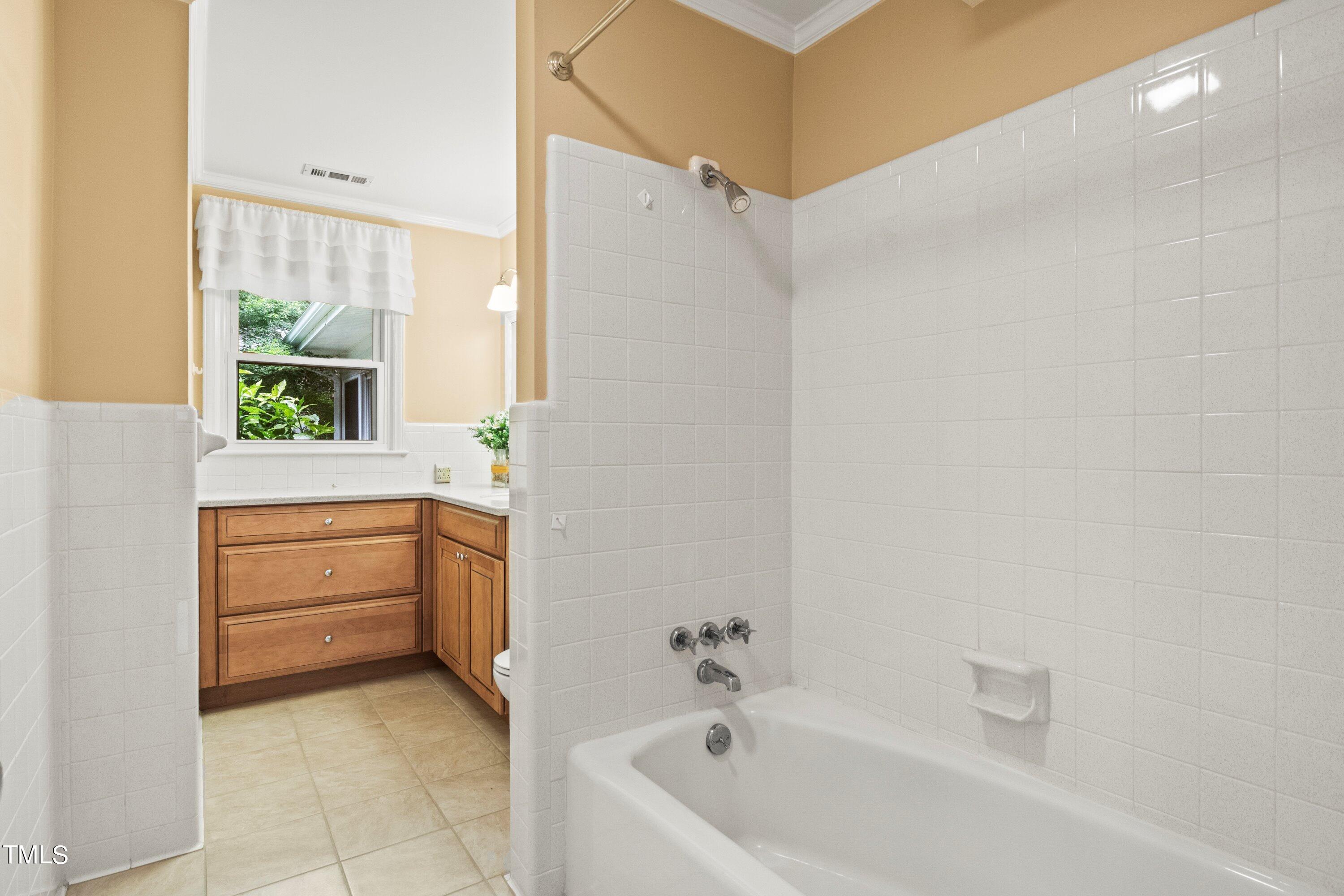 4809 Connell Drive Raleigh, NC 27612 - Photo 29 of 51 Full Hall Bathroom