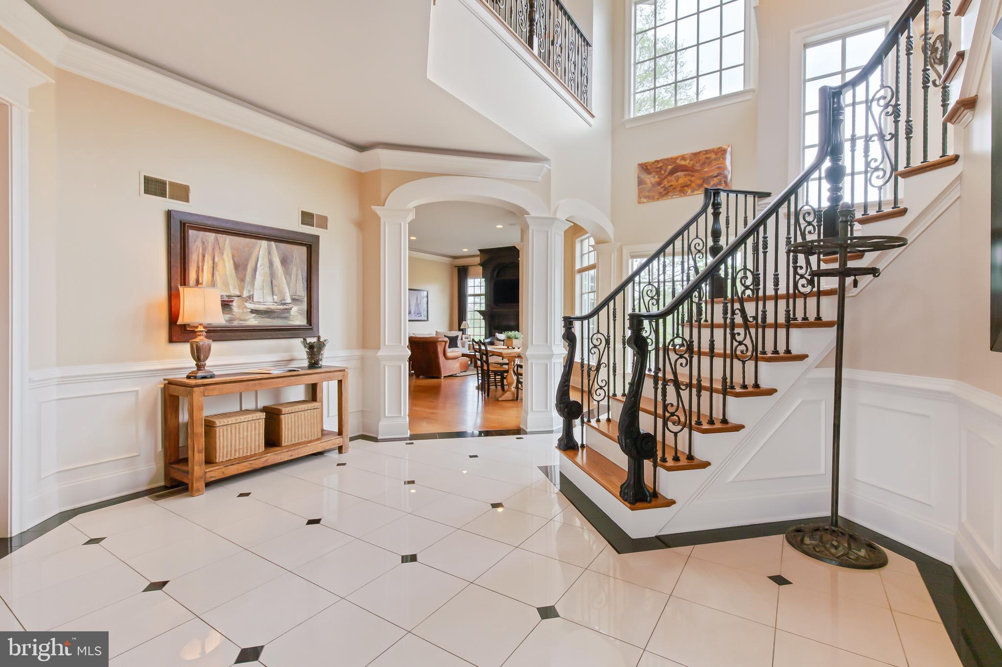 618 Willow Green Lititz, PA 17543 - Photo 11 of 63 a view of staircase with white walls and chandelier