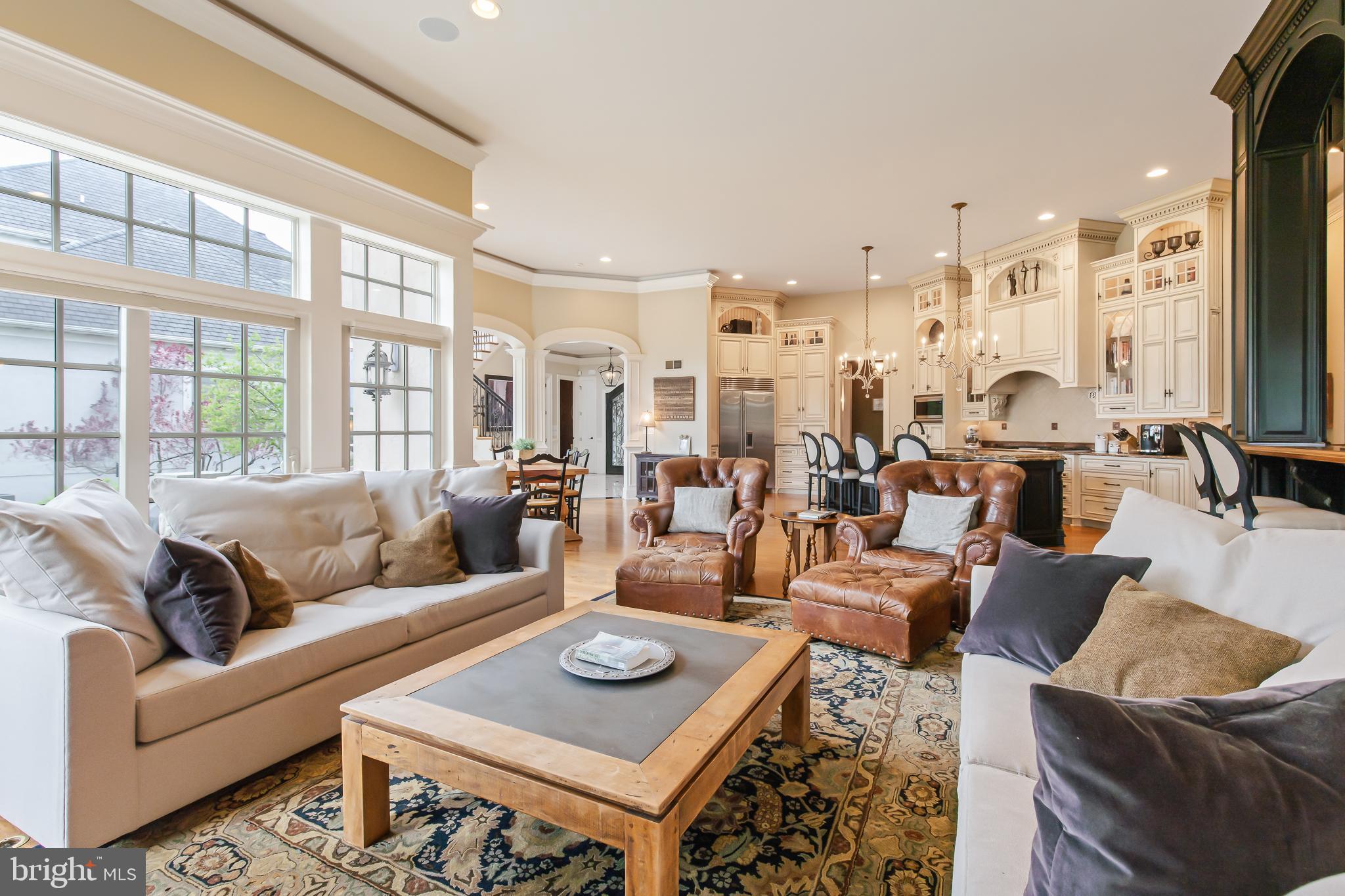 618 Willow Green Lititz, PA 17543 - Photo 15 of 63 a living room with furniture kitchen view and large windows