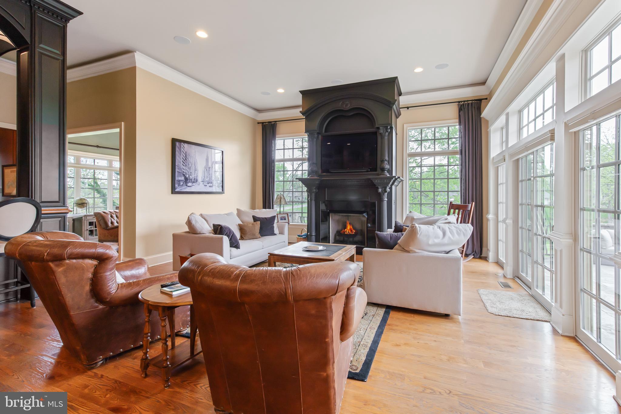 618 Willow Green Lititz, PA 17543 - Photo 17 of 63 a living room with furniture fireplace and a large window