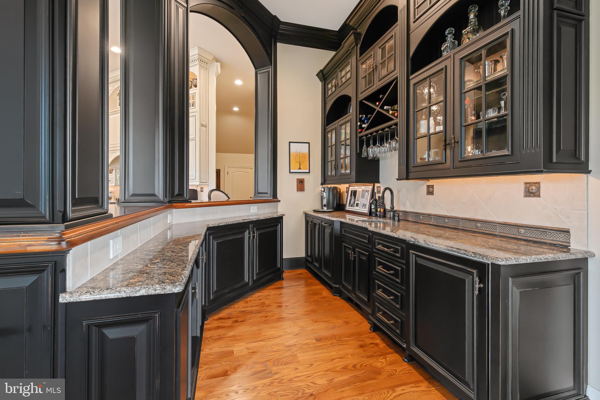 618 Willow Green Lititz, PA 17543 - Photo 19 of 63 a kitchen with stainless steel appliances granite countertop a stove and a sink