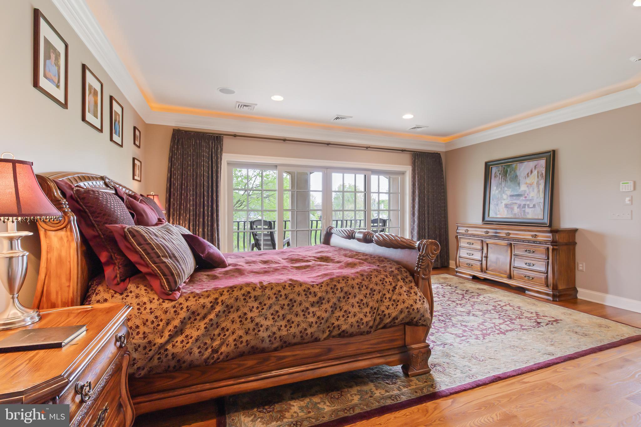 618 Willow Green Lititz, PA 17543 - Photo 34 of 63 a bedroom with a bed and wooden floor