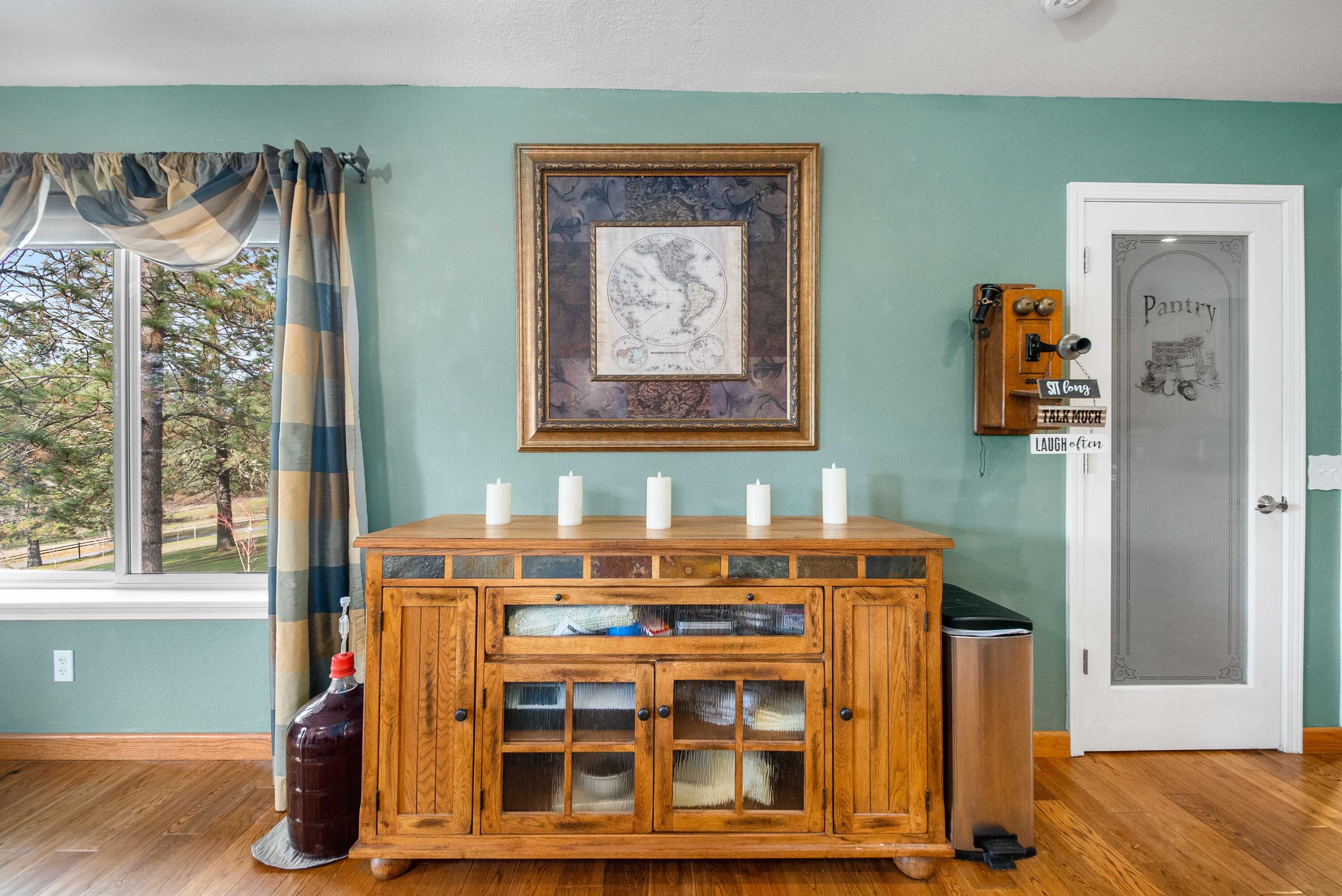 1280 Crow Road Merlin, OR 97532 - Photo 13 of 44 a view of a bedroom with wooden floor and a window
