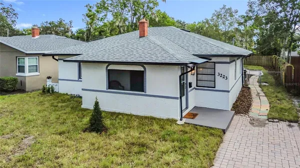 a aerial view of a house with garden