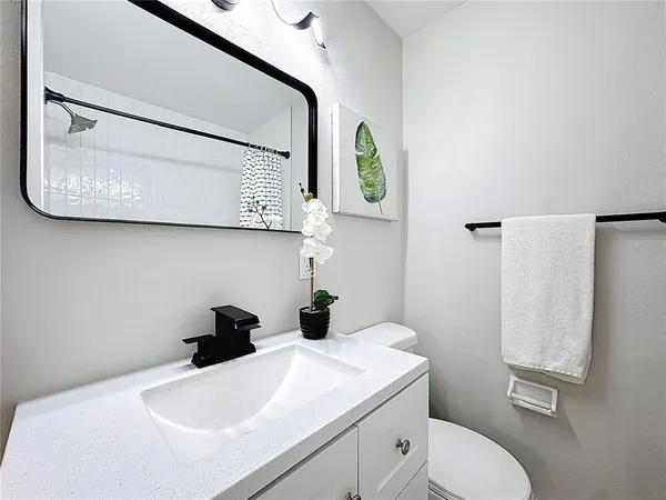 a bathroom with bathtub and shower