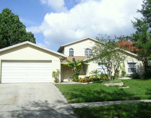 792 Brookside Road Maitland, FL 32751 - Photo 1 of 1 a view of a house with a yard
