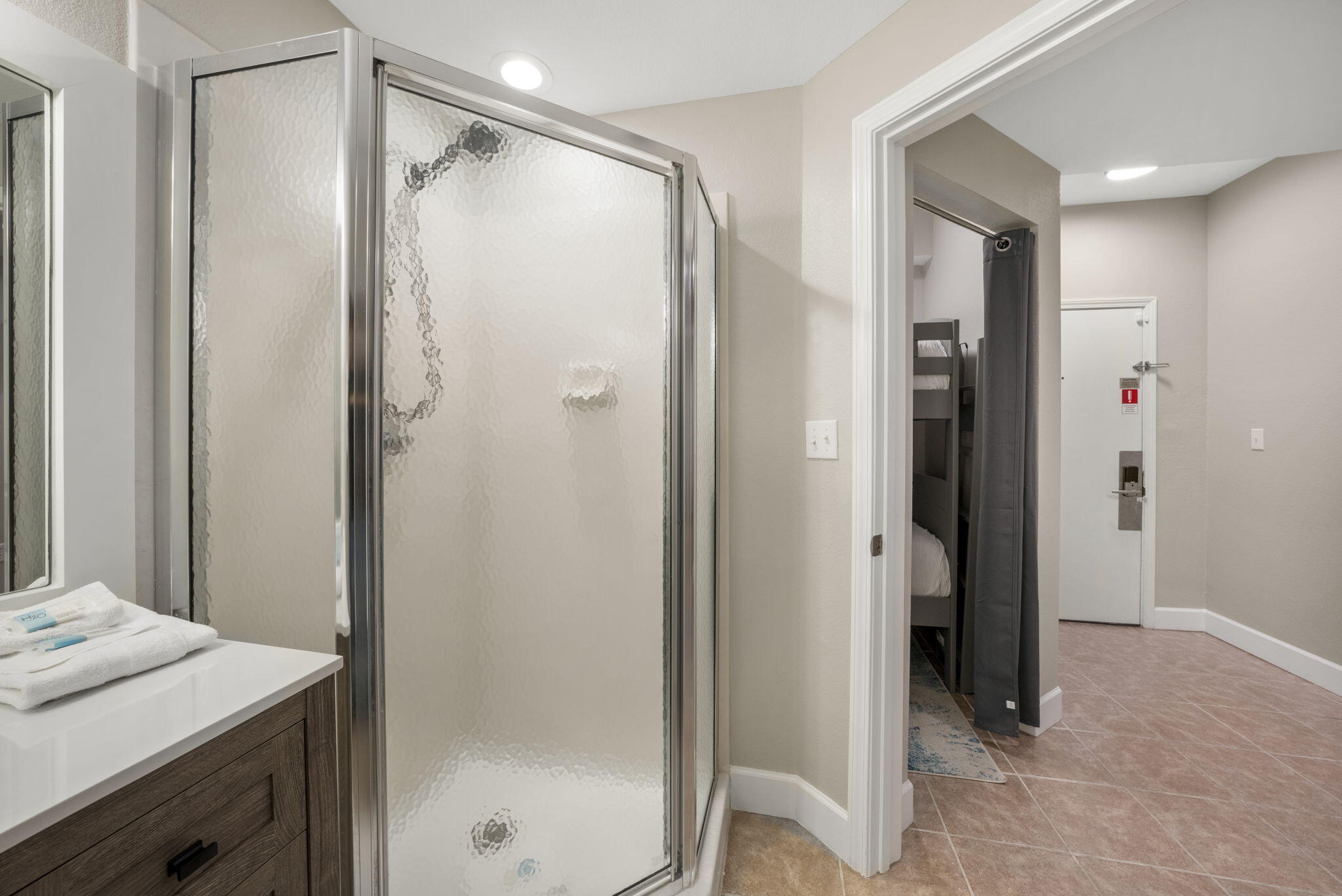 16819 Front Beach Road, Unit 2116 Panama City Beach, FL 32413 - Photo 13 of 51 a bathroom with a shower and a sink