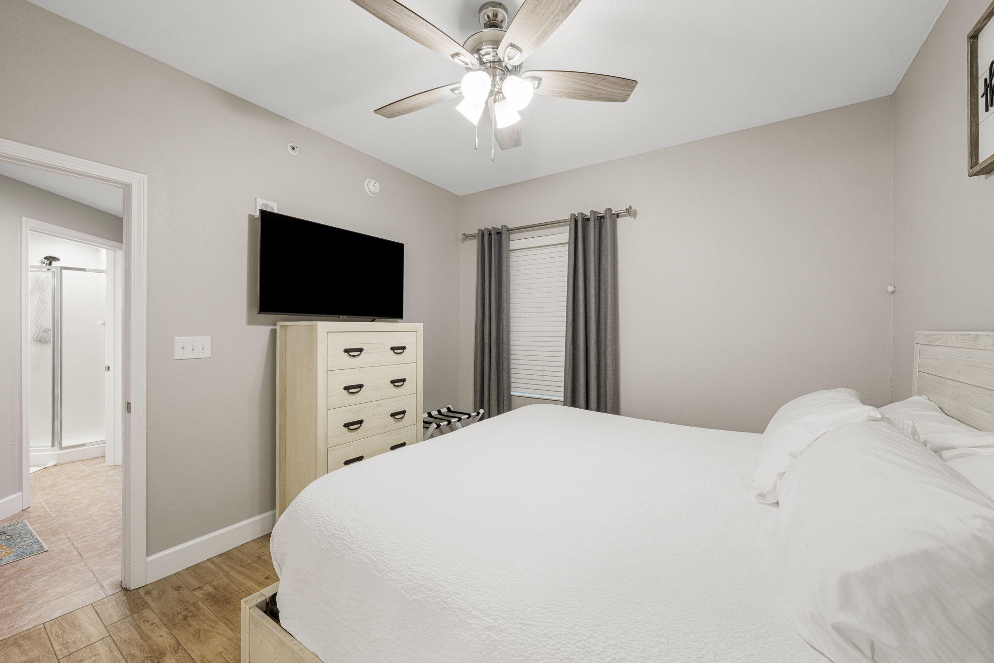 16819 Front Beach Road, Unit 2116 Panama City Beach, FL 32413 - Photo 17 of 51 a large white bed in a white room