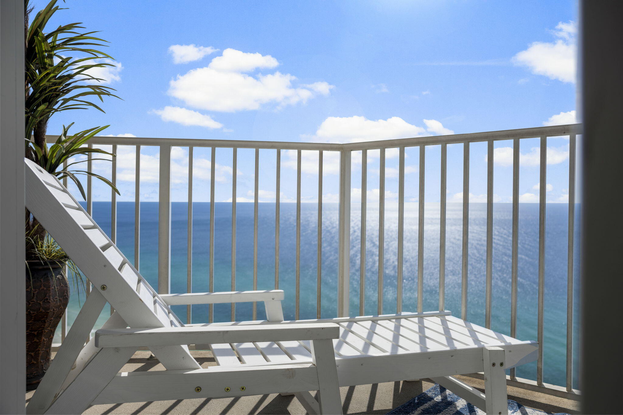 16819 Front Beach Road, Unit 2116 Panama City Beach, FL 32413 - Photo 22 of 51 a balcony with wooden floor