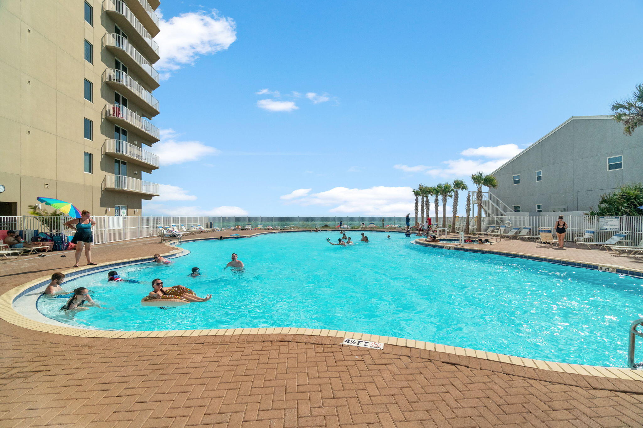 16819 Front Beach Road, Unit 2116 Panama City Beach, FL 32413 - Photo 31 of 51 a view of swimming pool with a yard
