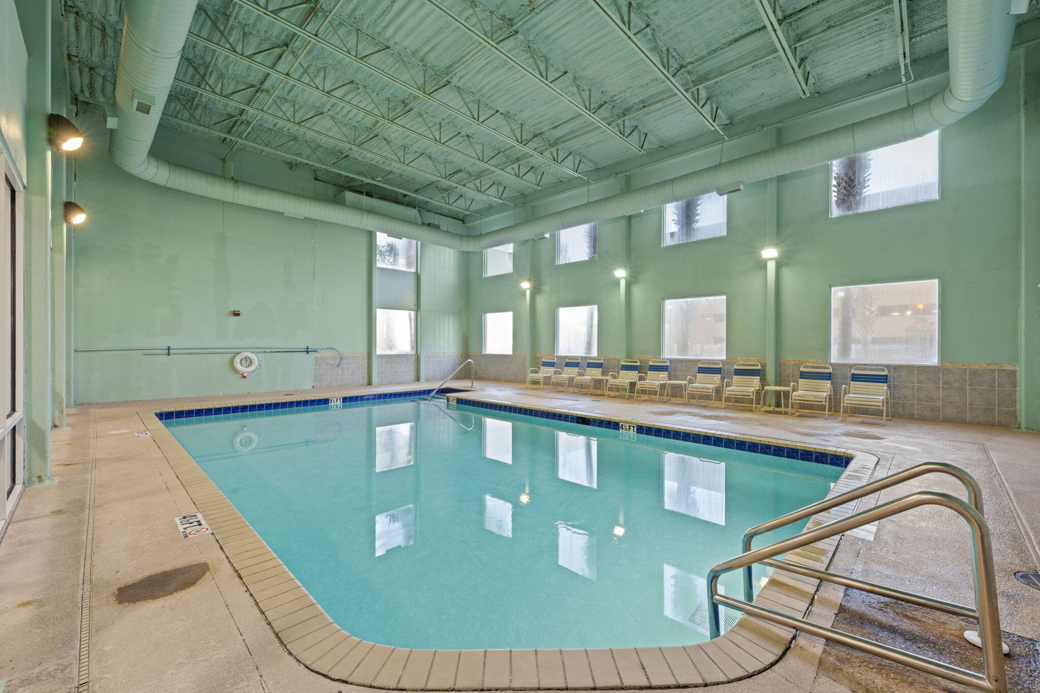 16819 Front Beach Road, Unit 2116 Panama City Beach, FL 32413 - Photo 40 of 51 a bathroom with a tub sink and mirror