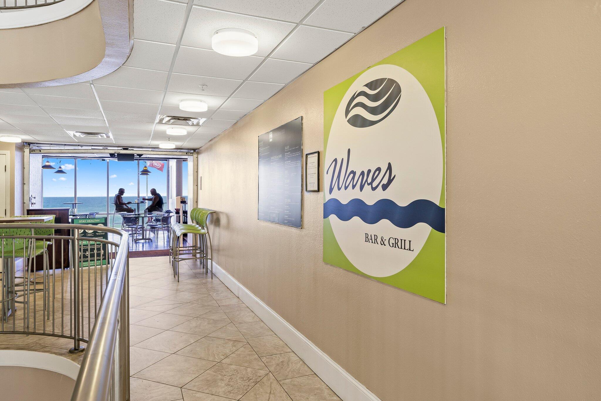 16819 Front Beach Road, Unit 2116 Panama City Beach, FL 32413 - Photo 44 of 51 a view of a room with workspace and a couch