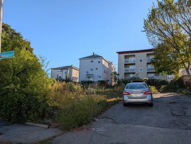a car parked in front of a house
