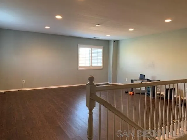 38325 Encanto Road Murrieta, CA 92563 - Photo 11 of 17 a view of room with window and wooden floor