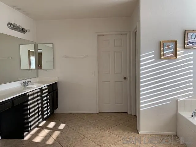 38325 Encanto Road Murrieta, CA 92563 - Photo 13 of 17 a view of an empty room with a window