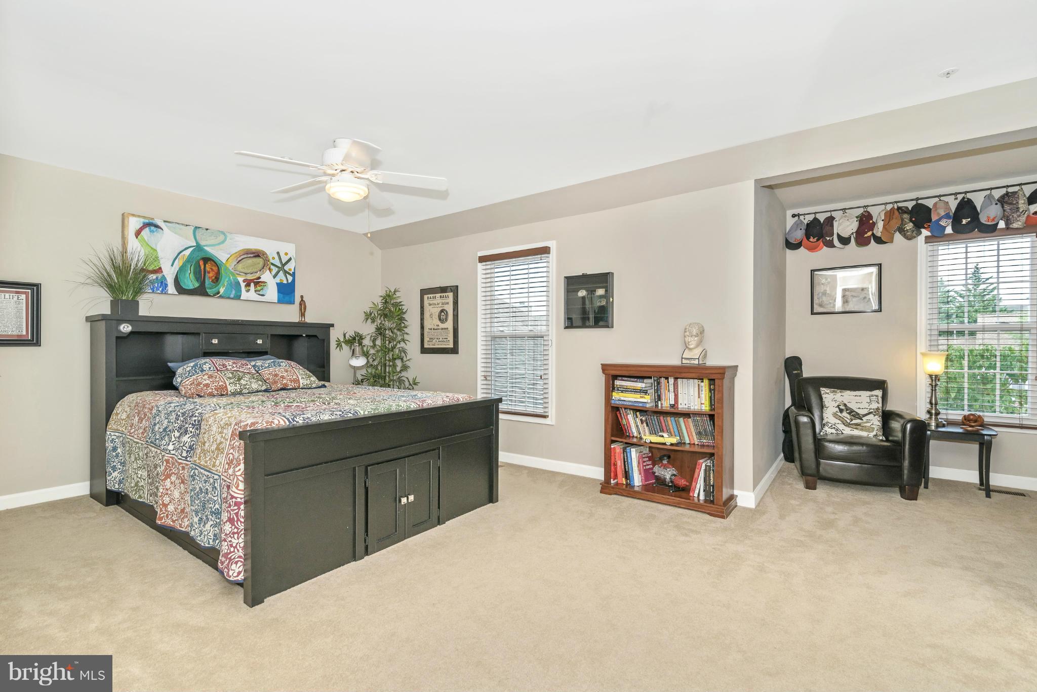 2443 Bear Den Road Frederick, MD 21701 - Photo 23 of 30 a bedroom with a bed and furniture