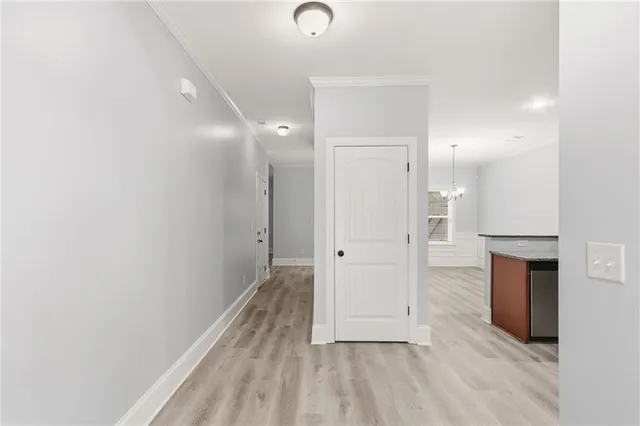 a bathroom with a granite countertop sink and a bathtub