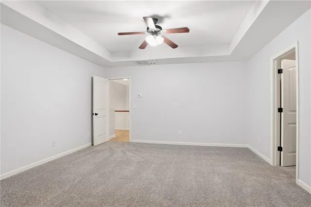 a front view of a house with a garage