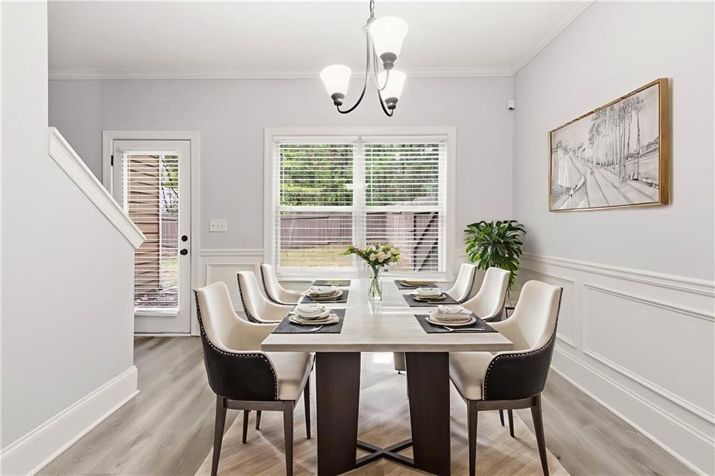 199 Mount Moriah Road Ball Ground, GA 30107 - Photo 5 of 39 a view of a dining room with furniture window and outside view