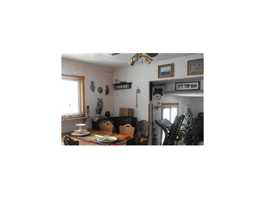 7823 West Mill Pond Road Beloit, WI 53511 - Photo 10 of 11 a picture of a living room with a sink and a mirror