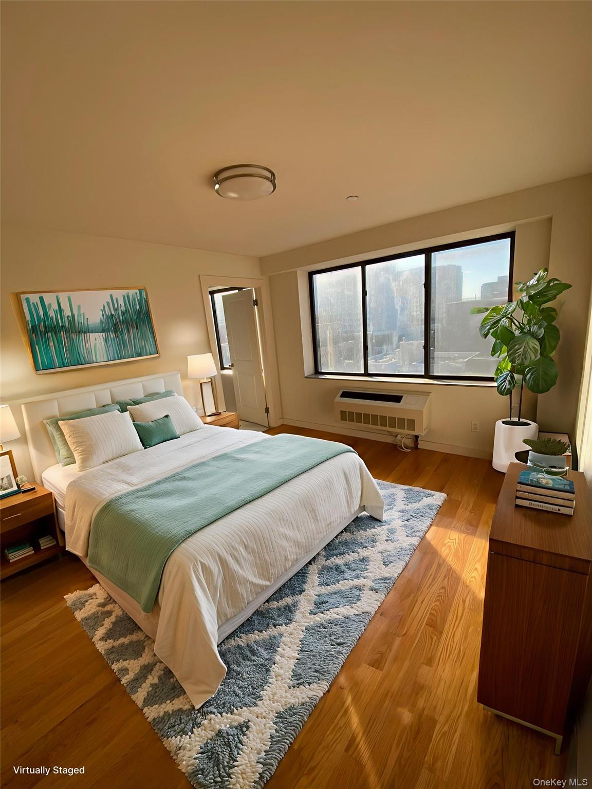 132-35 41st Road, Unit 10A Queens, NY 11355 - Photo 7 of 18 Bedroom featuring wood finished floors and a wall mounted air conditioner