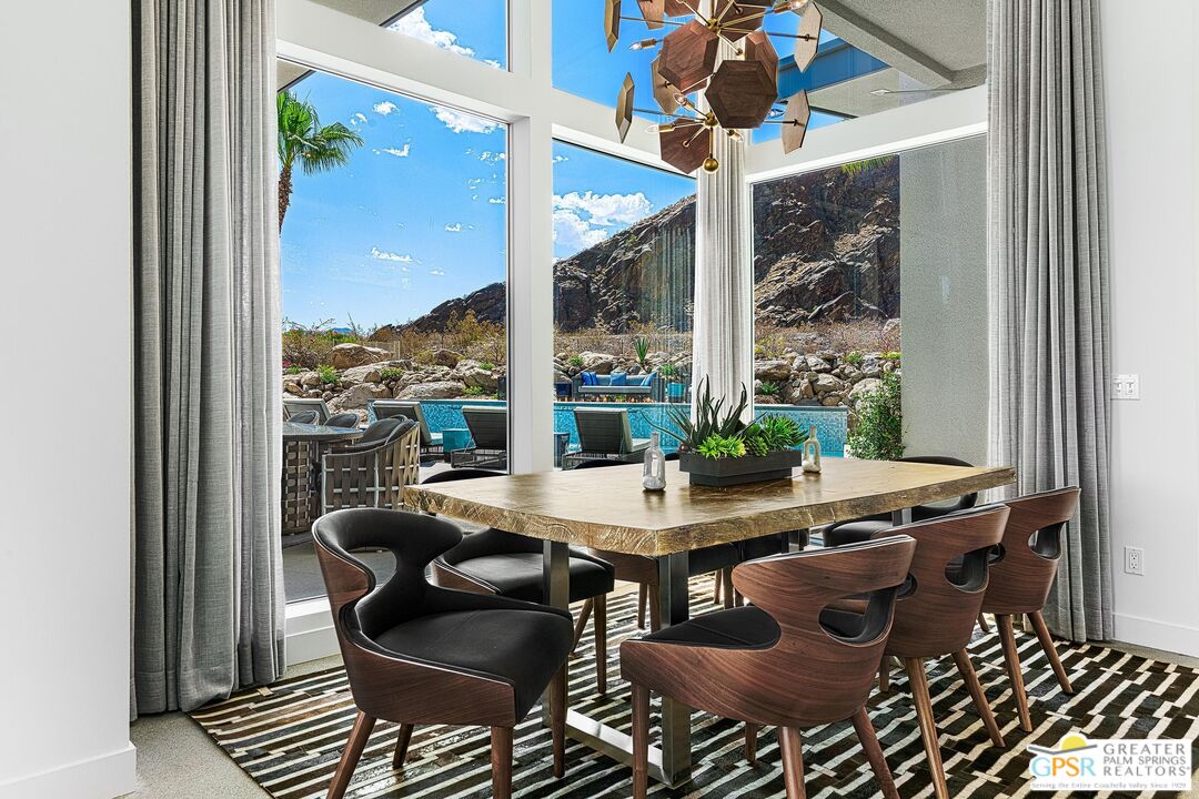 775 South La Mirada Road Palm Springs, CA 92264 - Photo 13 of 59 a view of a dining room with furniture window and outside view