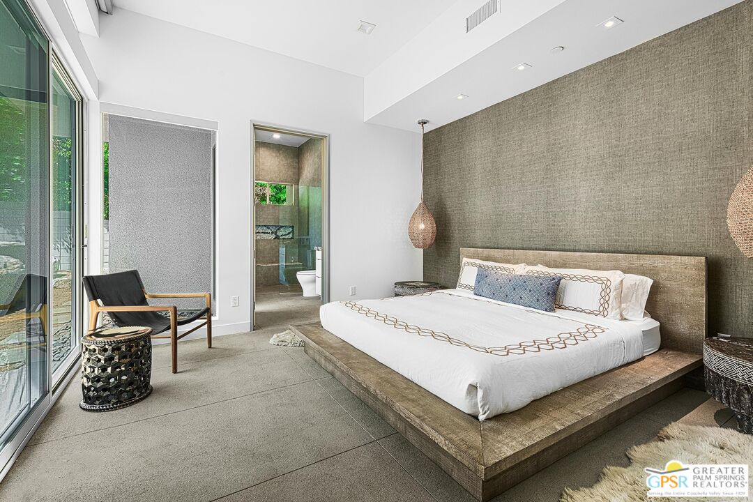775 South La Mirada Road Palm Springs, CA 92264 - Photo 26 of 59 a bedroom with a bed and a window
