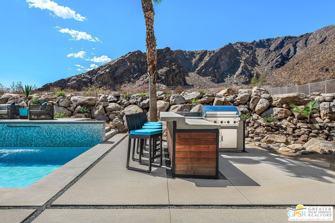 775 South La Mirada Road Palm Springs, CA 92264 - Photo 38 of 59 a view of a chairs and table in the river