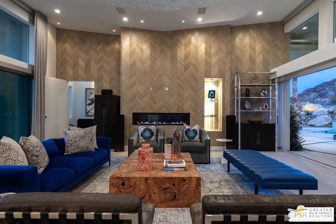 775 South La Mirada Road Palm Springs, CA 92264 - Photo 44 of 59 a living room with furniture and a fireplace