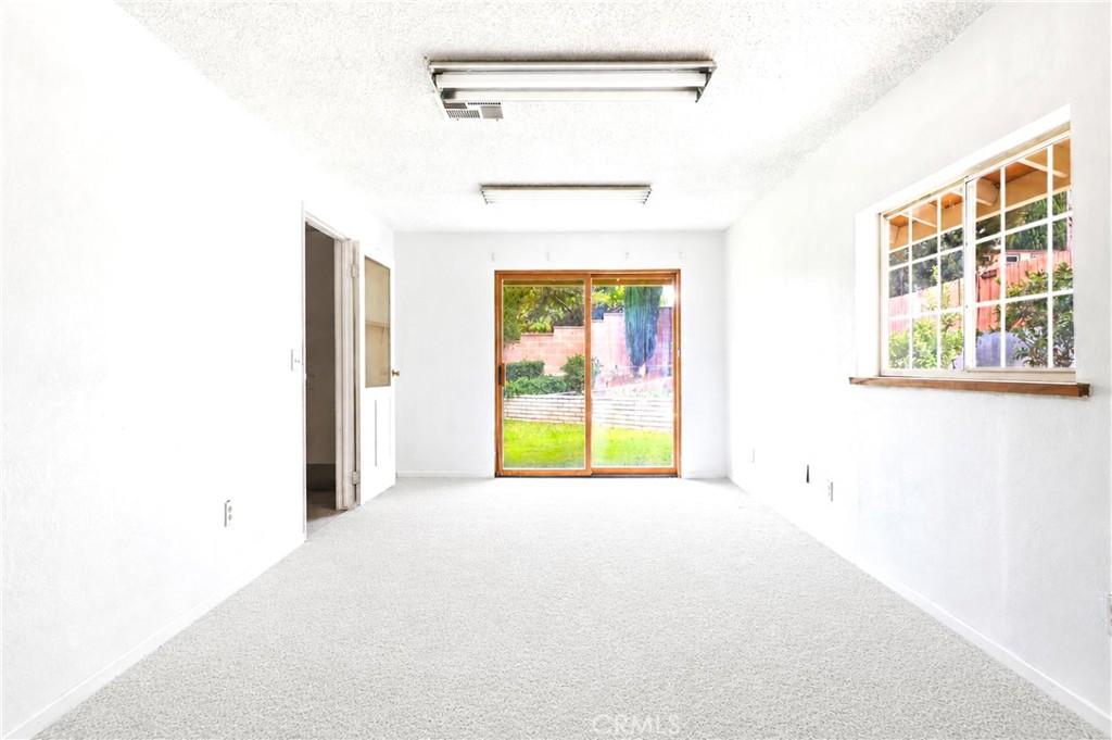 2145 Fairview Avenue Riverside, CA 92506 - Photo 27 of 35 a view of a room with a window and a ceiling fan