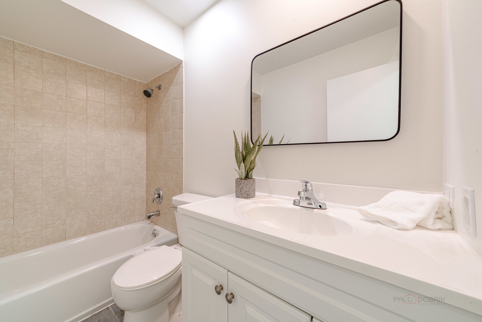 887 Saybrook Lane Buffalo Grove, IL 60089 - Photo 20 of 28 a bathroom with a sink toilet and shower