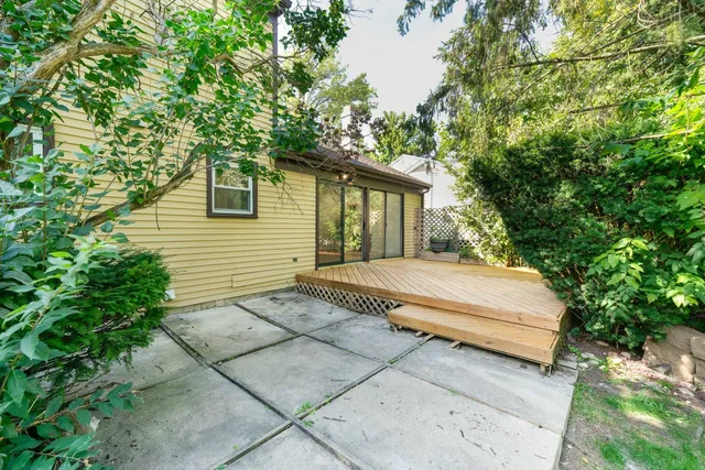 a house with trees in front of it