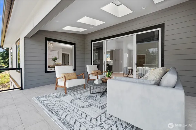 a front view of a house with a glass windows