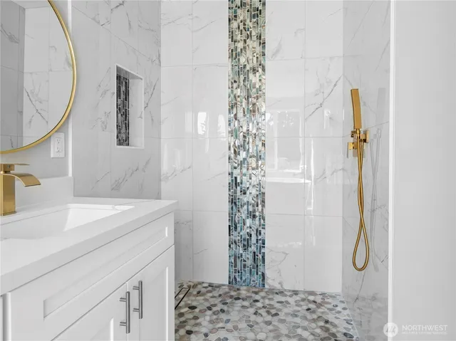 a white bath tub sitting next to a window